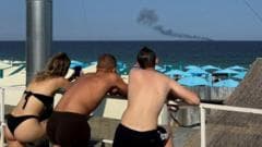 "Todos en la playa miran los misiles en el cielo": el contraste de Odesa, el balneario de lujo de Ucrania donde los turistas conviven con bombardeos diarios