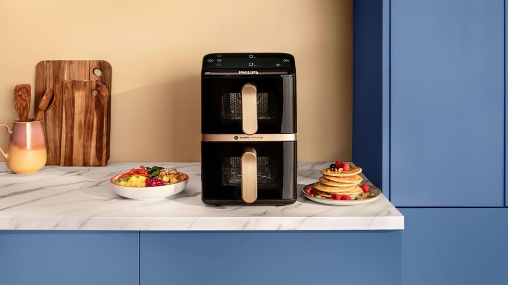 Philips estrena nueva freidora de aire para cocinas pequeñas con doble cesta y ventanas para ver los alimentos